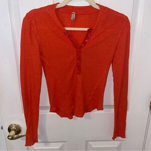 FREE PEOPLE orange waffle knit long sleeve top with snap buttons size xs
